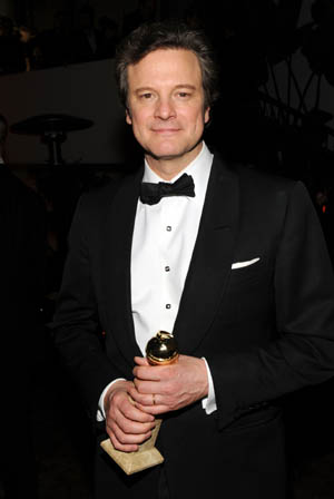 Colin Firth accepts his BAFTA as <i>The King’s Speech</i> sweeps awards