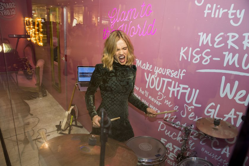 Florrie performs in Boots window at Westfield London, kicking off live entertainment for Soap & Glory
