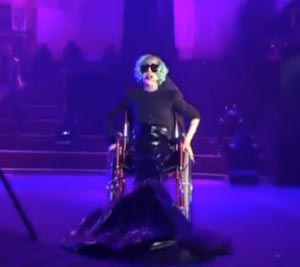 Lady Gaga courts publicity using a wheelchair as Sydney concert prop