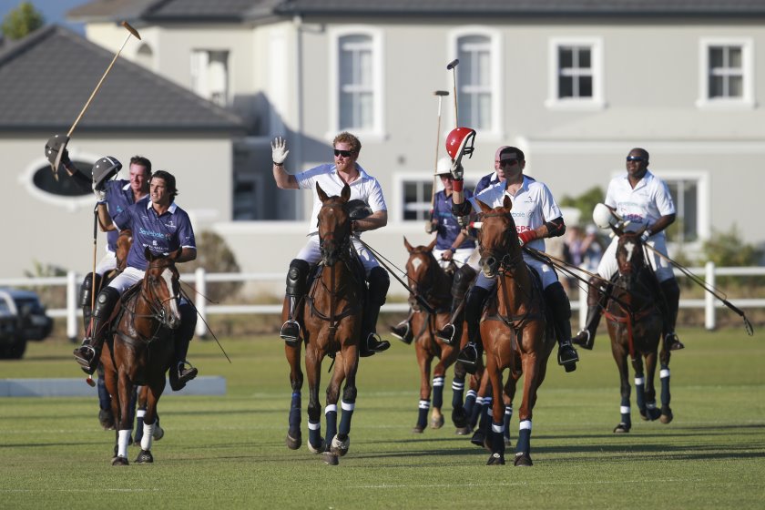 Prince Harry plays at Sentebale’s sixth annual polo match in South Africa; over £3 million raised