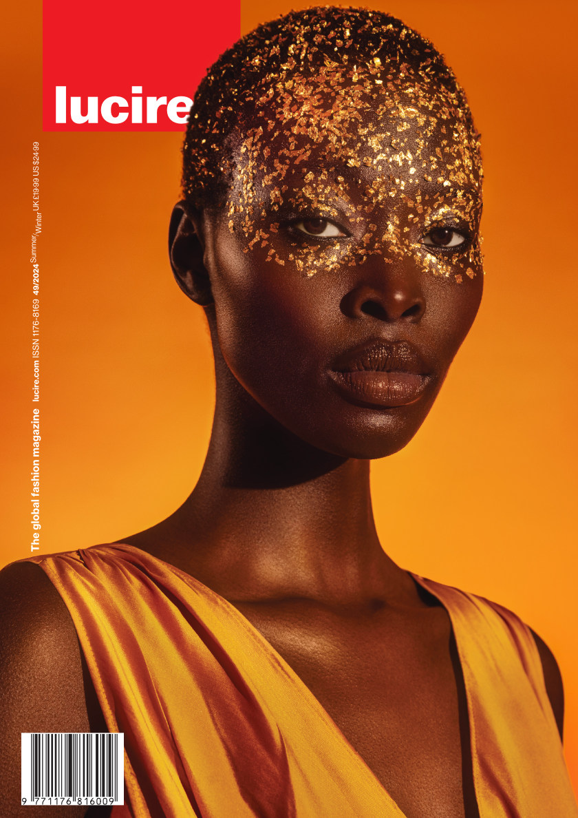 Lucire issue 49 cover with model and orange background