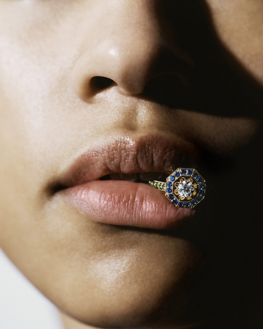 Mellerio ring in a model's mouth