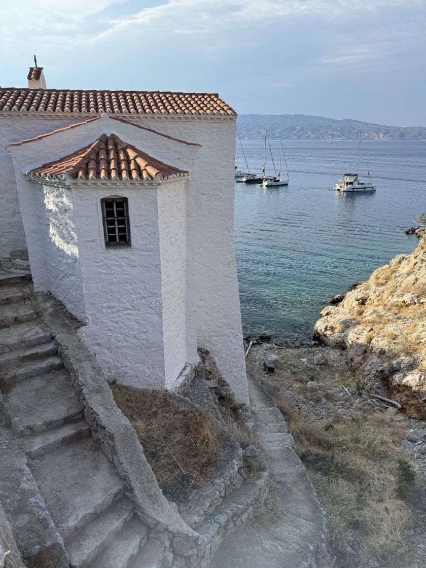 Church with bay behind it.