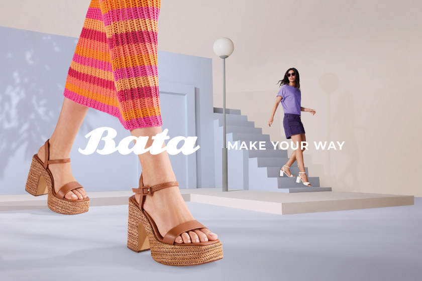 Bata key visual showing a pair of shoes in the foreground and a woman wearing Bata shoes in the background